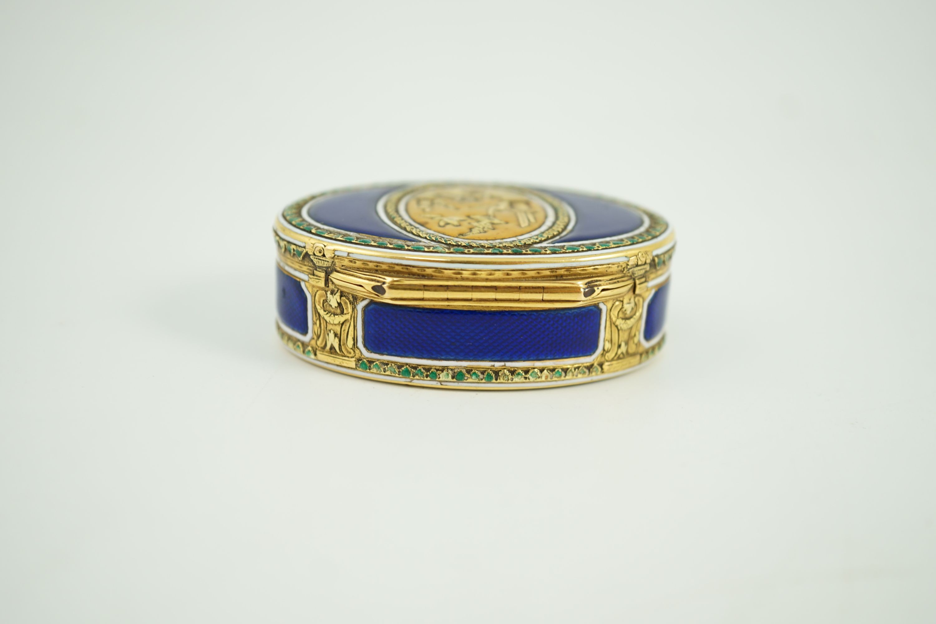 A late 18th/early 19th century French? gold and polychrome enamel oval snuff box